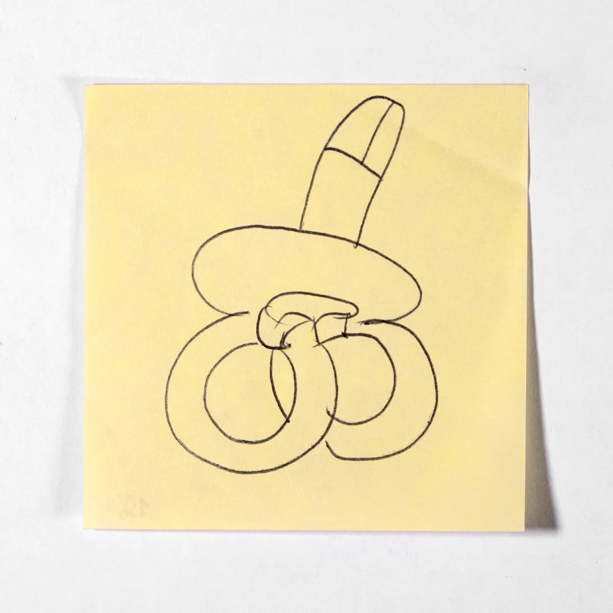 Pacifier, No. 156 of 512: a hand-drawn cazzo on a sticky note