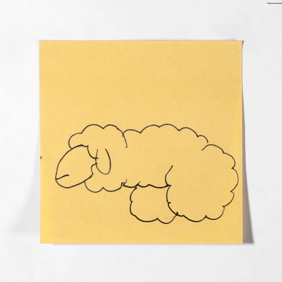 Sheep, No. 205 of 512: a hand-drawn cazzo on a sticky note