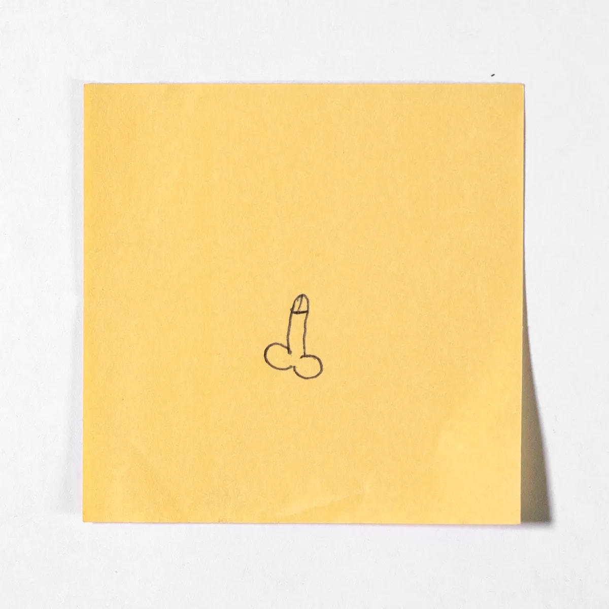 S, No. 017 of 512: a hand-drawn cazzo on a sticky note